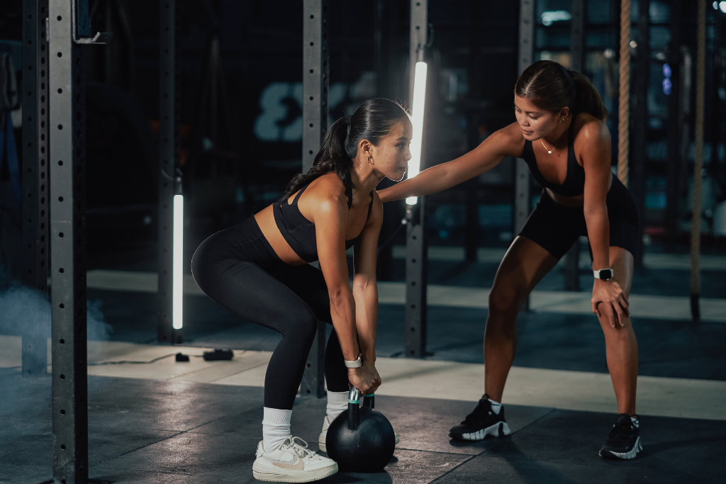 Rent gym space NYC personal trainer training client at ITS